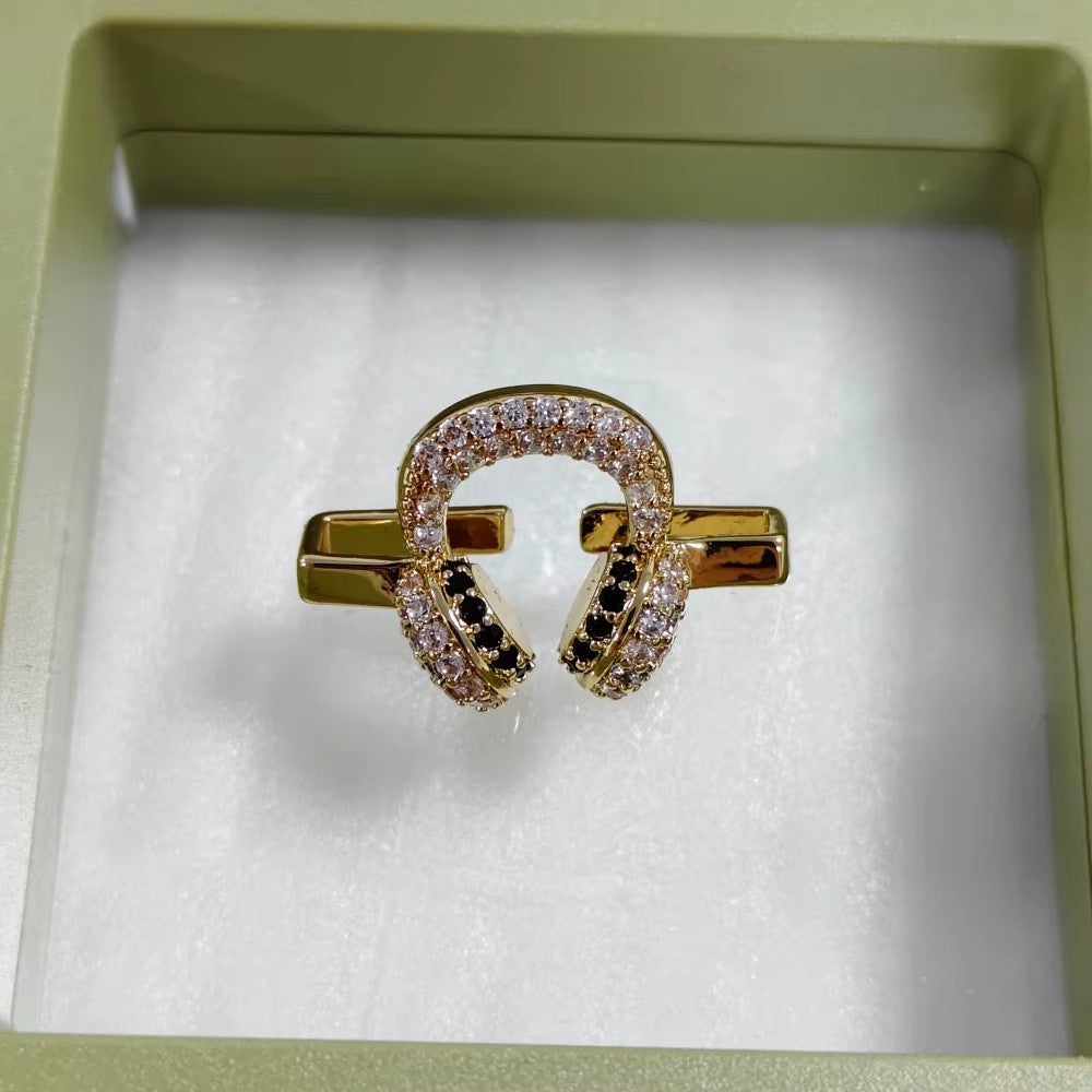 Charm Clip · Earphones, gold
