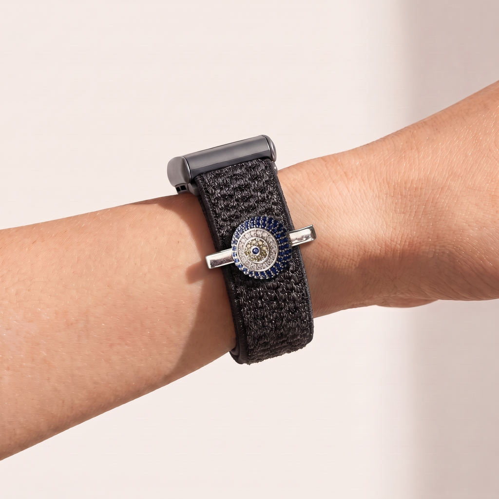 Charm Clip · Blue Eyes, silver worn on a knit band